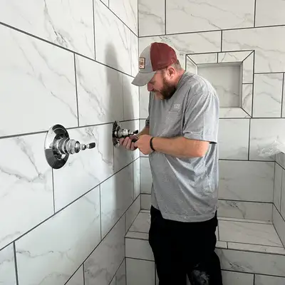 Local Plumber doing his work